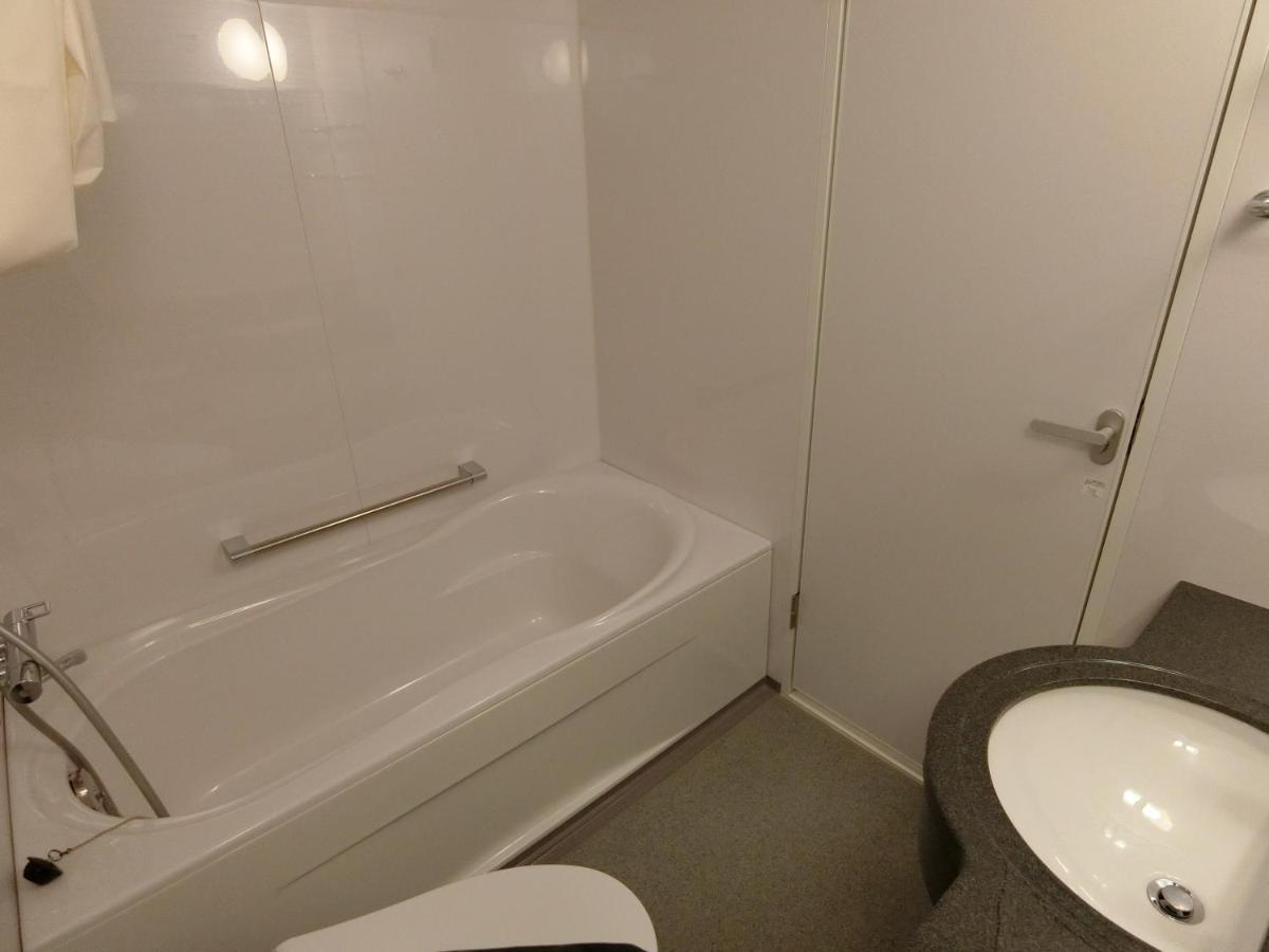 Studio Inn Nishi Shinjuku Токио Экстерьер фото